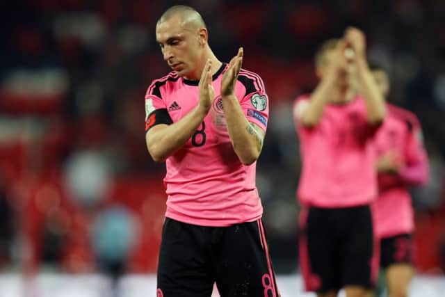 A dejected Scott Brown claps the Scotland fans after his side's 3-0 defeat by England at Wembley. Picture: Mike Egerton/PA Wire.