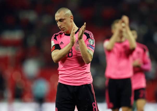 A dejected Scott Brown claps the Scotland fans after his side's 3-0 defeat by England at Wembley. Picture: Mike Egerton/PA Wire.
