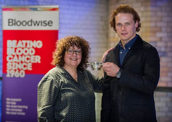 Yvonne, of Bloodwise, with Outlander star Sam Heughan. Picture: Contributed