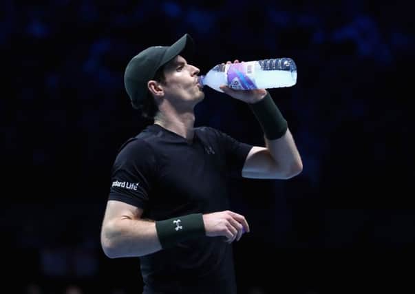 Andy Murray takes a drinks break during his epic win over Kei Nishikori. Today he faces Stan Wawrinka. Picture: Getty Images