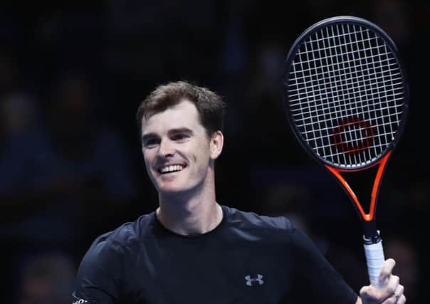 Jamie Murray celebrates victory after he and doubles partner Bruno Soares won through to the semi-finals of the ATP World Tour Finals in London. Picture: Clive Brunskill/Getty