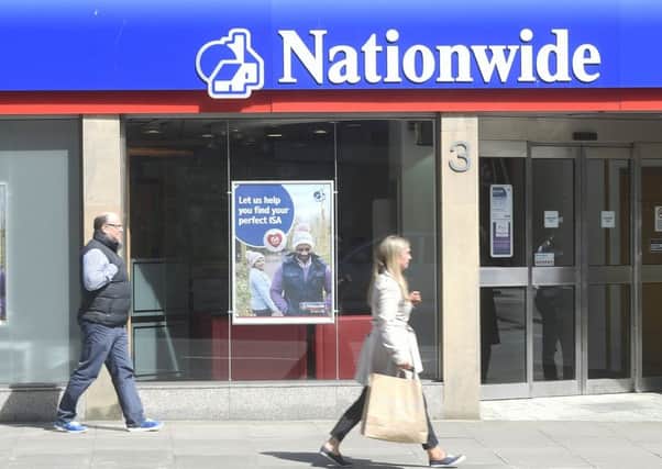Nationwide's profits were hit after it passed on the base rate cut to mortgage customers. Picture: Greg Macvean
