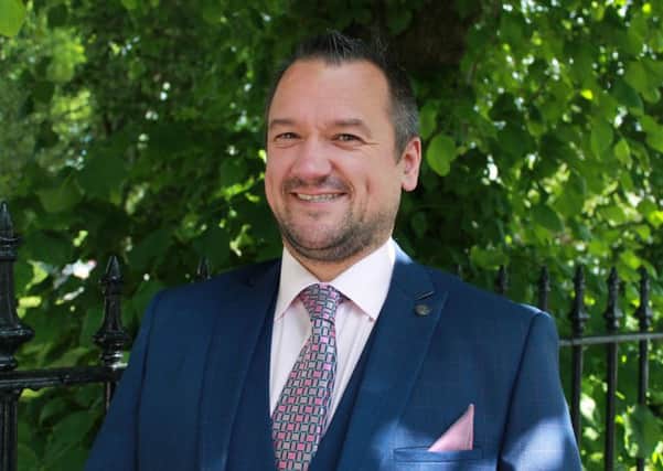 Businessman Phil Anderson donates dream holiday to Christmas event. Picture: Contributed