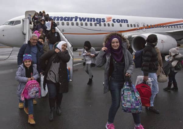 Syrian refugees disembark from their plane  in Lappeenranta, Finland
Picture: Getty