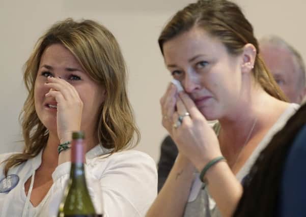 MELBOURNE, AUSTRALIA - NOVEMBER 09:  Democrat voters react to the election result at a 'Democrats Abroad' event on November 9, 2016 in Melbourne, Australia. Americans have gone to the polls today, November 8 in the U.S., to elect the 45th President of the United States. Hillary Clinton represents the Democrats and, if successful, would be the first woman president in American history. Donald Trump represents the Republicans and his campaign has been dogged by bad publicity, despite this the polls show that either of the two contenders could win with the election too close to call. There has been huge interest in the United States Election in Australia, with many people arranging viewing parties around the country to watch the results live.  (Photo by Darrian Traynor/Getty Images)