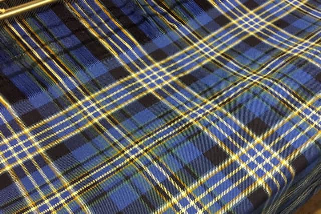 The finished tartan which will raise funds for The Fishermen's Mission. PIC Contributed.