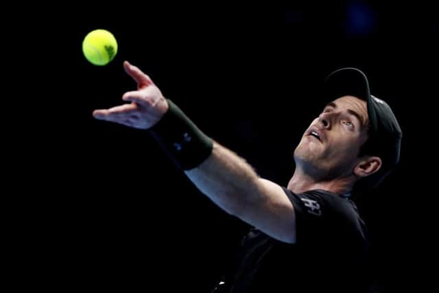 Andy Murray serves to Stan Wawrinka during his straight sets win over the Swiss. Pic: Kirsty Wigglesworth/AP