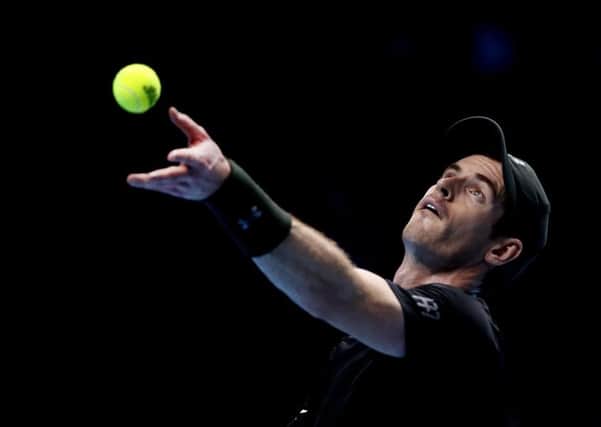 Andy Murray serves to Stan Wawrinka during his straight sets win over the Swiss. Pic: Kirsty Wigglesworth/AP