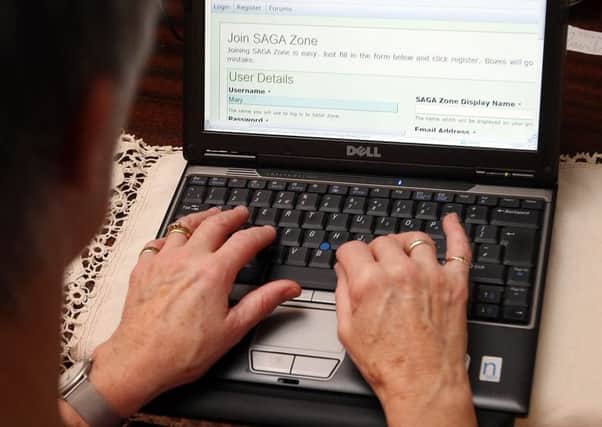 LONDON - NOVEMBER 01: Pensioner Mary Devlin uses a laptop computer to look at the Saga Zone website on November 1, 2007 in London, England. A social networking site for the over 50s has been launched by the SAGA group. 13,000 people have already signed up to the new site called Saga Zone - which has many forums covering topics as diverse as relationships and gardening tips. (Photo by Peter Macdiarmid/Getty Images)