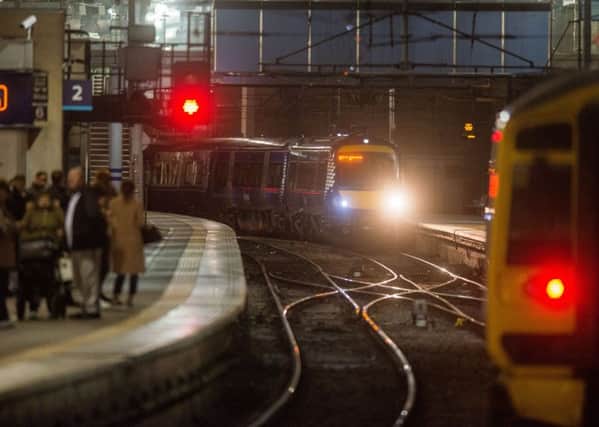 A train departs Edinburgh Waverley, where only 53.8 per cent arrive on time. Picture: Ian Georgeson