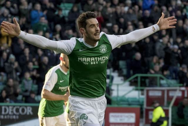Brian Graham celebrates scoring Hibs' opening goal versus Queen of the South. Picture: SNS
