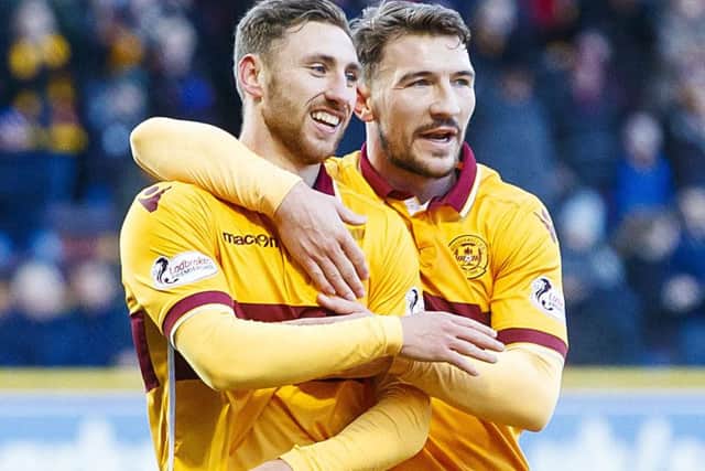Louis Moult, left, is congratulated by Craig Clay after his opener. Picture: Roddy Scott/SNS