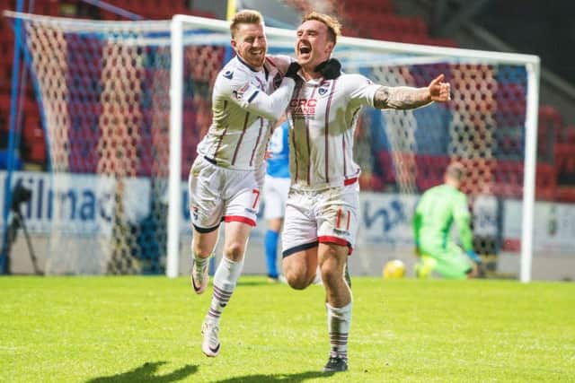 Ross Countys Craig Curran, right, celebrates with Michael Gardyne after scoring his sides third goal at McDiarmid Park. Photograph: Ian Georgeson/SNS