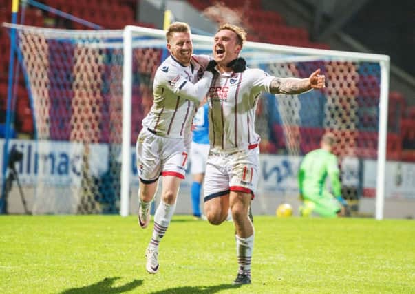 Ross Countys Craig Curran, right, celebrates with Michael Gardyne after scoring his sides third goal at McDiarmid Park. Photograph: Ian Georgeson/SNS