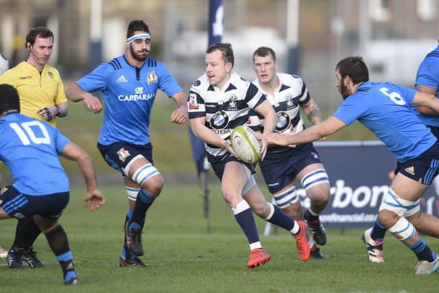 Heriot'sTom Wilson bursts through. Picture: Greg Macvean