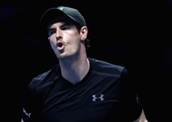 Andy Murray gestures on court during his men's singles semi final against Milos Raonic at the ATP World Tour Finals at O2 Arena.  (Photo: Julian Finney/Getty