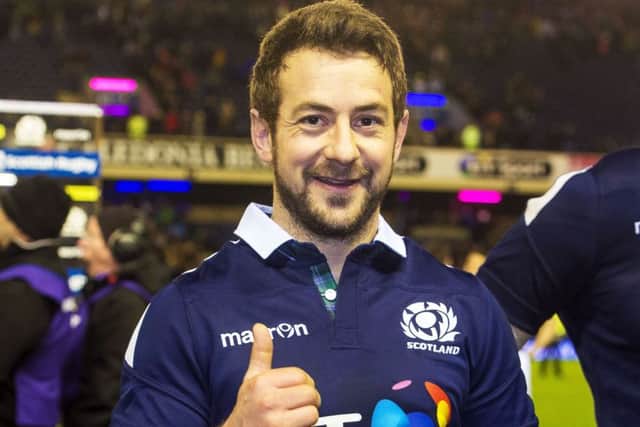 Scotland's Greig Laidlaw celebrates at full time. Photo: SNS