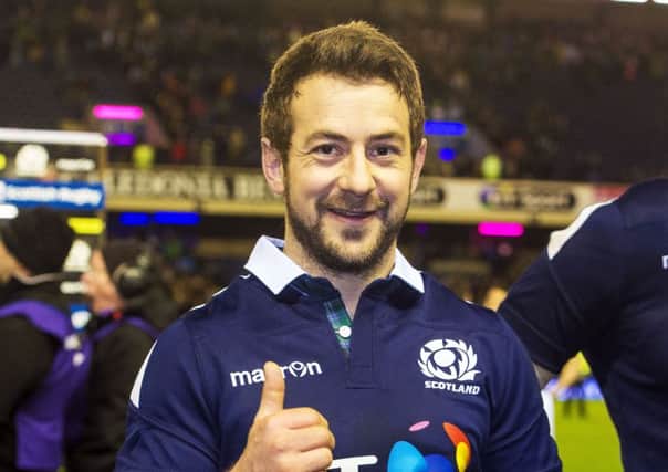 Scotland's Greig Laidlaw celebrates at full time. Photo: SNS