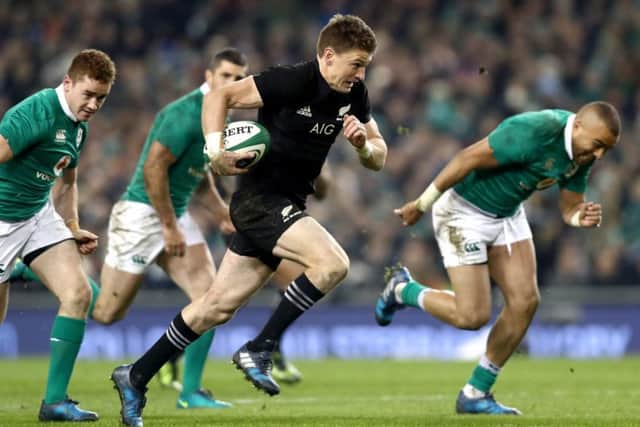 All Black Beauden Barrett breaks away. The world player of the year scored a controversial try. Photograph: Phil Walter/Getty