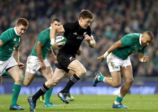 All Black Beauden Barrett breaks away. The world player of the year scored a controversial try. Photograph: Phil Walter/Getty