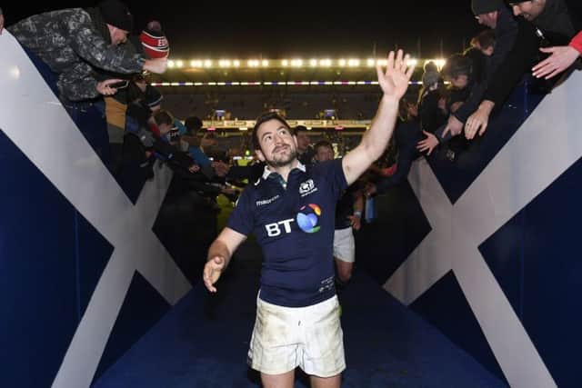 Captain Greig Laidlaw takes the acclaim of the Scotland fans after his last-gasp kick sealed victory over Argentina. Picture: Gary Hutchison/SNS/SRU