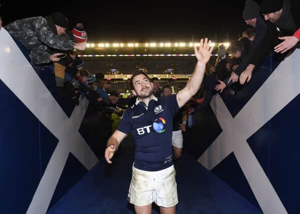 Captain Greig Laidlaw takes the acclaim of the Scotland fans after his last-gasp kick sealed victory over Argentina. Picture: Gary Hutchison/SNS/SRU