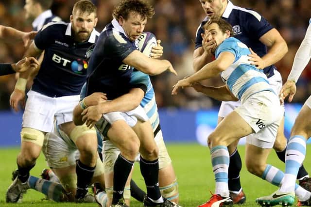 Scotland's Hamish Watson charges ahead with the ball during the win over Argentina. Picture: Jane Barlow/PA