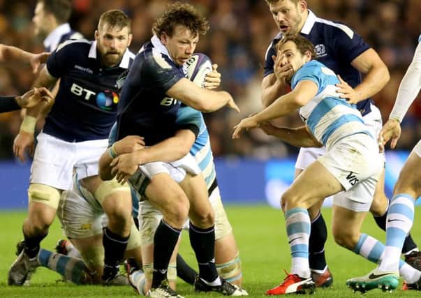 Scotland's Hamish Watson charges ahead with the ball during the win over Argentina. Picture: Jane Barlow/PA
