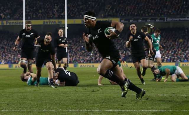 New Zealand's Malakai Fekitoa on his way to scoring his side's third try during the Autumn International match at the Aviva Stadium, Dublin.  Photograph: Brian Lawless/PA