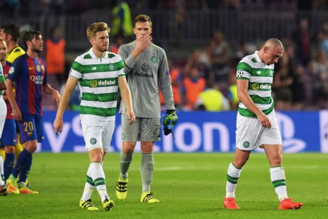 Stuart Armstrong trudges off after Celtic's 7-0 Champions League drubbing at the hands of Barcelona. Picture: Craig Williamson/SNS