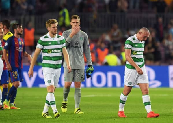 Stuart Armstrong trudges off after Celtic's 7-0 Champions League drubbing at the hands of Barcelona. Picture: Craig Williamson/SNS