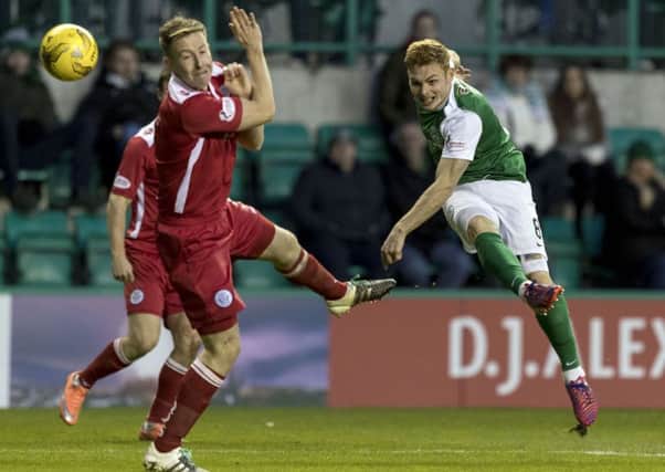 Hibernian's Fraser Fyvie fires in a shot during the easy win over Queen of the South. Picture: SNS