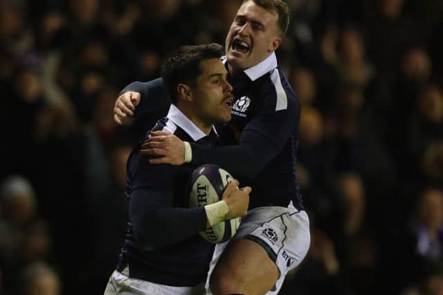 Sean Maitland celebrates with Stuart Hogg after scoring  a try against Argentina at Murrayfield. Picture: Ian MacNicol/Getty Images