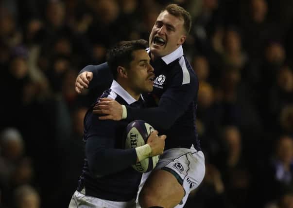 Sean Maitland celebrates with Stuart Hogg after scoring  a try against Argentina at Murrayfield. Picture: Ian MacNicol/Getty Images