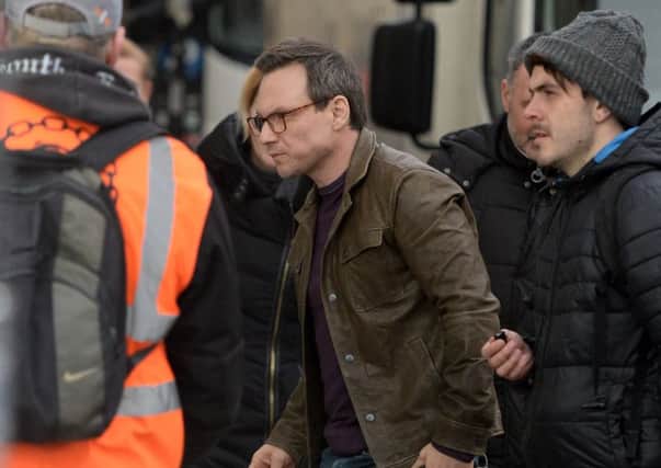 Hollywood actor Christian Slater in Glasgow city centre during filming for The Wife. Picture: SWNS