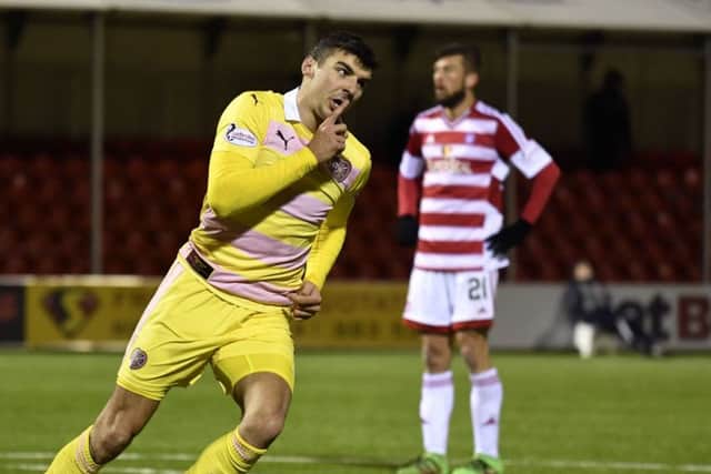 Hearts top scorer Callum Paterson silences the home fans at New Douglas Park after equalising three minutes from time. Picture: Rob Casey/SNS
