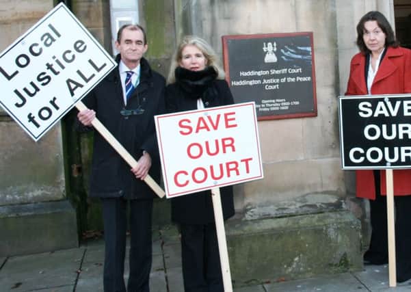 Campaigners outside Haddington Sheriff Court, which eventually shut in 2015 - one of 10 court buildings to be closed since 2010. Picture: TSPL