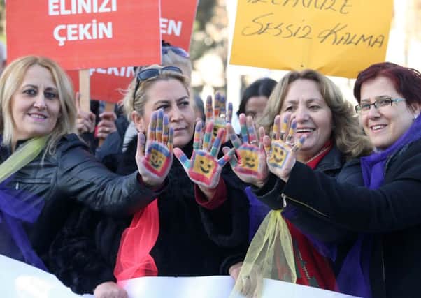 Protesters in front of the Turkish Parliament in Ankara welcome news that the bill had been withdrawn. Picture: AFP/Getty Images