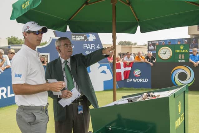 Alastair Scott, pictured with Nicolas Colsaerts on the first tee in Dubai last week, is the European Tour's new official starter