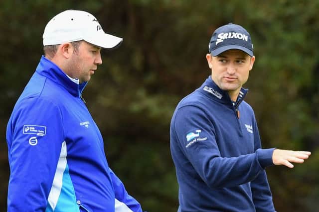 Scotland's Duncan Stewart, left, and Russell Knox play a practice round ahead of the World Cup of Golf at Kingston Heath in Melbourne.  Picture: Quinn Rooney/Getty Images