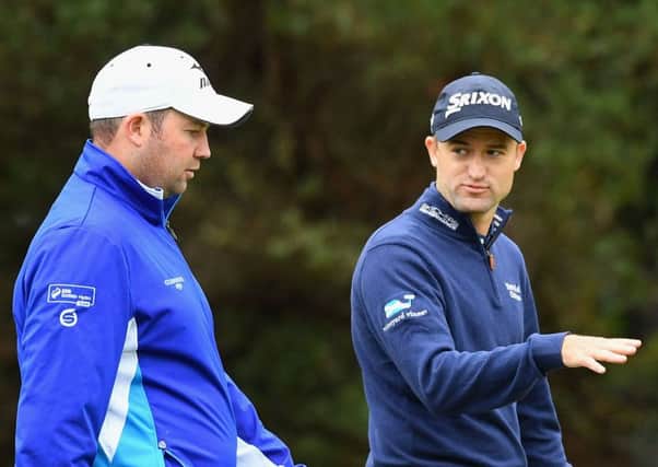 Scotland's Duncan Stewart, left, and Russell Knox play a practice round ahead of the World Cup of Golf at Kingston Heath in Melbourne.  Picture: Quinn Rooney/Getty Images