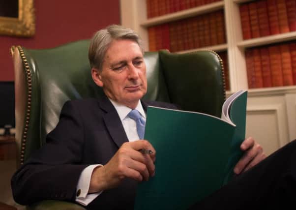 Chancellor Philip Hammond is like a magician 'devoid of hat and rabbit', writes Martin Flanagan. Picture: Stefan Rousseau/PA Wire