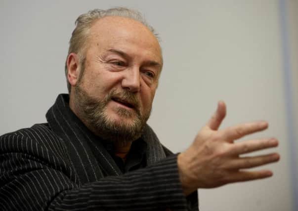 George Galloway was showered in glitter as he addressed students in Aberdeen.