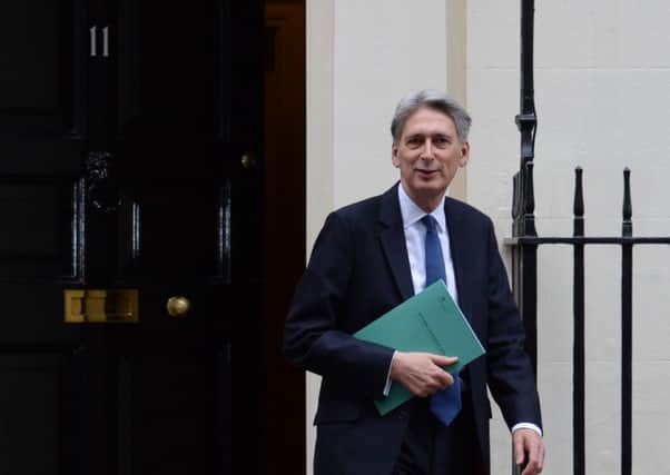 Chancellor Philip Hammond leaves 11 Downing Street as he prepares to deliver his Autumn Statement to the House of Commons. Picture: Stefan Rousseau/PA Wire