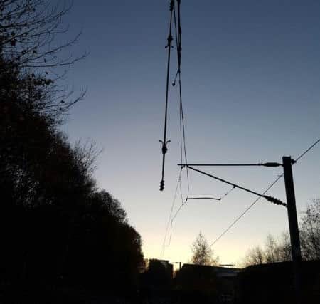 Damage to the overhead wires.