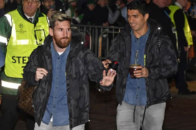 Lionel Messi and Luis Suarez arrive at Celtic Park ahead of the game. Picture: SNS