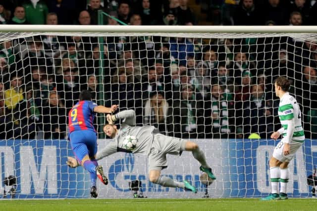 Craig Gordon denies Luis Suarez with a terrific save not long before half-time. Picture: PA