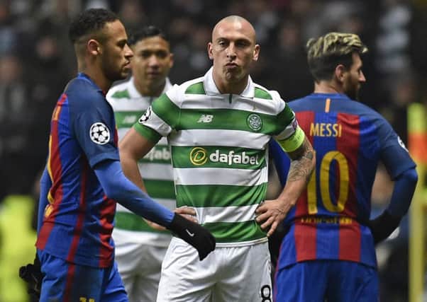 Celtic's Scott Brown is left dejected at the final whistle. Picture: Rob Casey/SNS