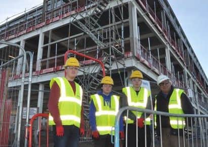 Craig, Jake and Rowan with site manager Iain Mackie.  Picture: Contributed