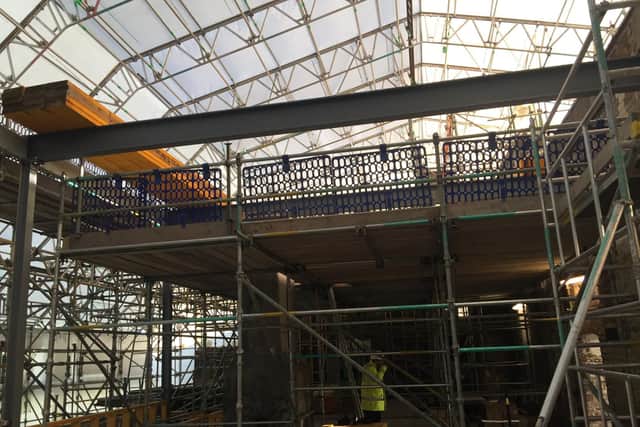 A temporary roof has been erected over the Mackintosh Building ahead of its 35 million restoration.